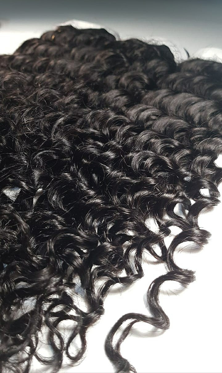 2 tissages Deep wave brésilien couleur naturelle 100%human hair  en qualité remy